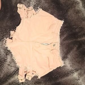 Baby pink raw hem buckle shorts